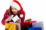 Lady Opening Christmas Gift Box Stock Photo