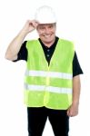 Matured Construction Worker Holding His Safety Helmet Stock Photo