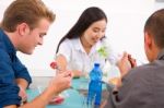 Diverse Group Of Friends Eating Food Stock Photo