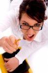 High Angle View Of Shouting Female Pointing With Pencil Stock Photo