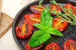 Baked Cherry Tomatoes With Basil And Thyme Stock Photo