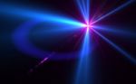 Star With Abstract Lens Flare Stock Photo