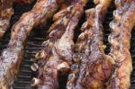 Traditional Meat Grilled On The Grill In The Argentine Countryside Stock Photo