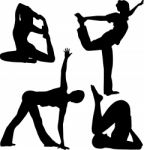 Silhouette People Doing Yoga Stock Photo