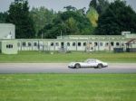 Vintage Car Driving Around Dunsfold Airfield Stock Photo