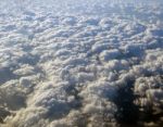 Aerial View Of Earth Covered In Clouds Stock Photo