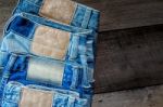 Blue Jean And Jean Lack Texture On The Wooden Floor Stock Photo