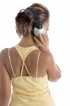 Back Pose Of Female With Headphone Stock Photo