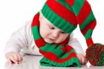 Baby With Christmas Hat And Scarf Stock Photo