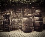 Old Traditional Wine Press And Oak Barrels Stock Photo