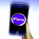 Plans On Mobile Phone Shows Objectives Planning And Organizing Stock Photo