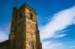 Sunlight Hitting Old Stone Church Tower Wall In A Sunny Day Stock Photo