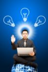 Business Man With Idea Bulb Stock Photo