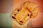 Custard Cake And Croissant Bread On Natural Clothes Stock Photo