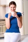 Woman Having A Cup Of Drink Stock Photo