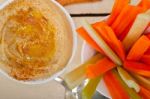 Fresh Hummus Dip With Raw Carrot And Celery Stock Photo