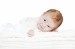 Blue Eyes Baby Boy On White Towels Stock Photo