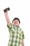 Boy Holding Up Cell Phone Stock Photo