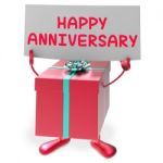 Happy Anniversary Sign And Gift Shows Cheerful Festivities And P Stock Photo