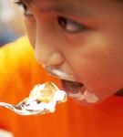 Messy Kid Eating Cream Cake Dessert Stock Photo