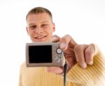 Portrait Of Man Holding Digital Camera Stock Photo