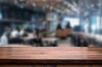 Selected Focus Empty Brown Wooden Table And Coffee Shop Or Resta Stock Photo