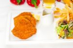 Classic Milanese Veal Cutlets And Vegetables Stock Photo