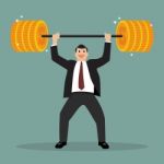 Businessman Lifting Exercise With Barbell Coin Weight Stock Photo