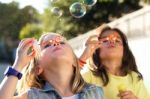 Group Of Childrens Having Fun In The Park Stock Photo