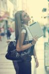 Young Business Woman With Tablet Computer Walking On Urban Stree Stock Photo