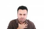 Young Ill Man Coughing Isolated Over White Background Stock Photo