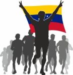 Athlete With The Venezuela Flag At The Finish Stock Photo