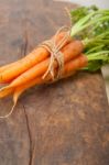 Baby Carrots Bunch Tied With Rope Stock Photo