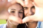 Young Couple Having Fun In A Park Stock Photo