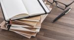 Notebook Stack On Wood Table Stock Photo