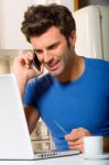 Man Speaking Over Phone Stock Photo