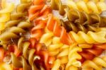 Uncook Fusilli Background Stock Photo