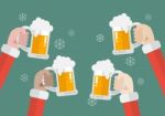 Santa Clinking Beer Glasses Stock Photo