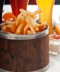 Fresh French Fries On A Bucket Stock Photo