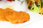 Classic Milanese Veal Cutlets And Vegetables Stock Photo