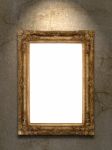 Gold Vintage Photo Frame On Grunge Wall Stock Photo