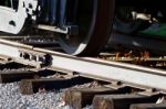 Photo Of The Train Wheels And The Road Stock Photo