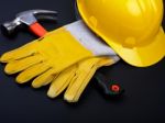 Hard Hat Hammer And Gloves Stock Photo