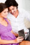 Couple Looking At Cds Stock Photo