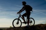 Young Man Riding Mountain Bike Stock Photo