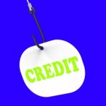 Credit On Hook Means Financial Loan Or Bank Money Stock Photo