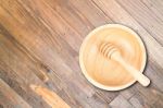 Wooden Bowl And Dipper On Wood Texture Background Stock Photo