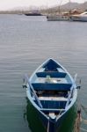 Rowing Boat In The Marina At Cannigione Stock Photo