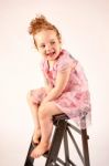 Little Girl Fashion Model In Rose Dress Stock Photo