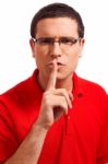 Younger Man Showing Silence Symbol Stock Photo